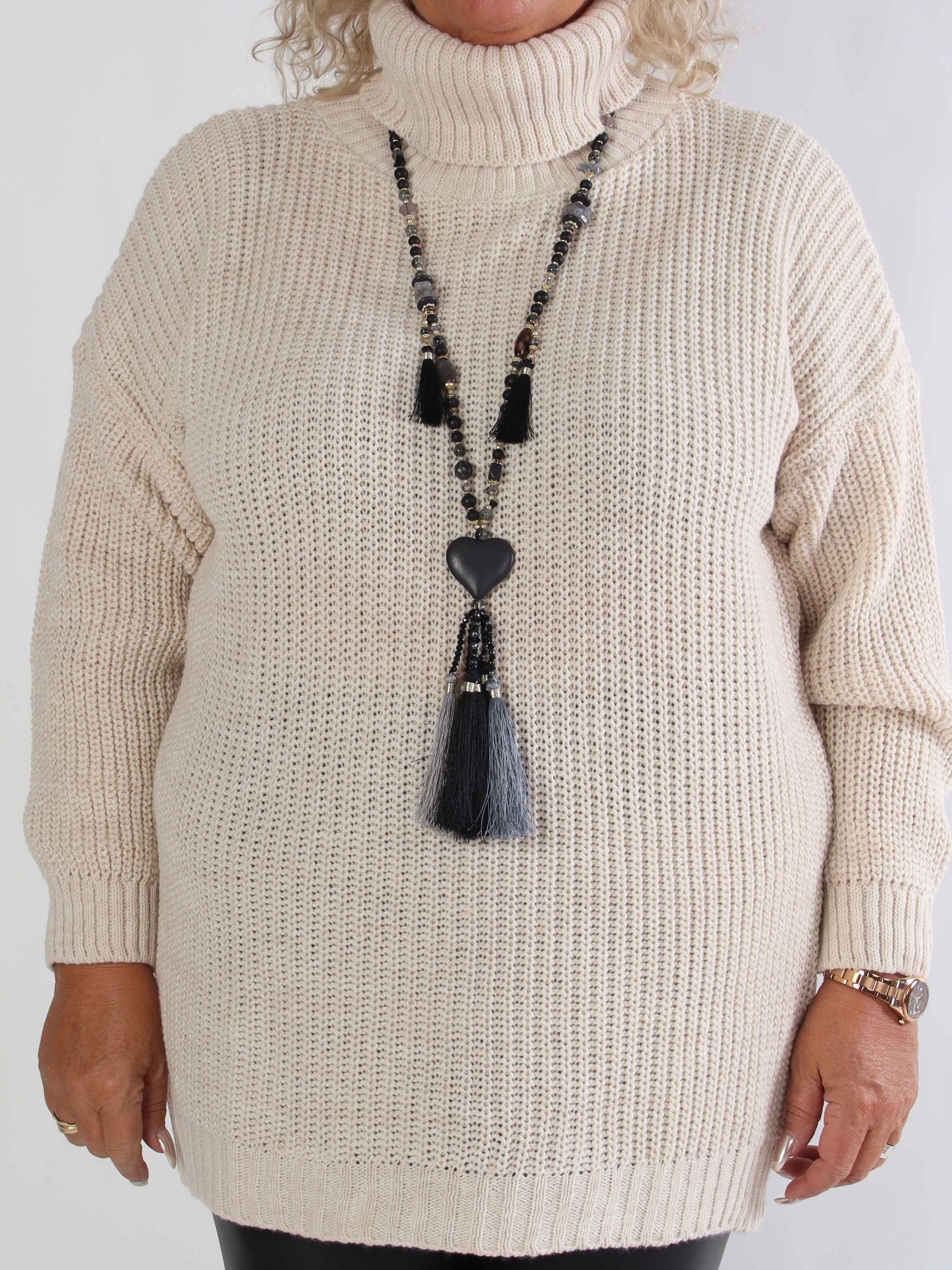 Cindy - Ensfarvet hyggelig plus size striktrøje med rullekrave