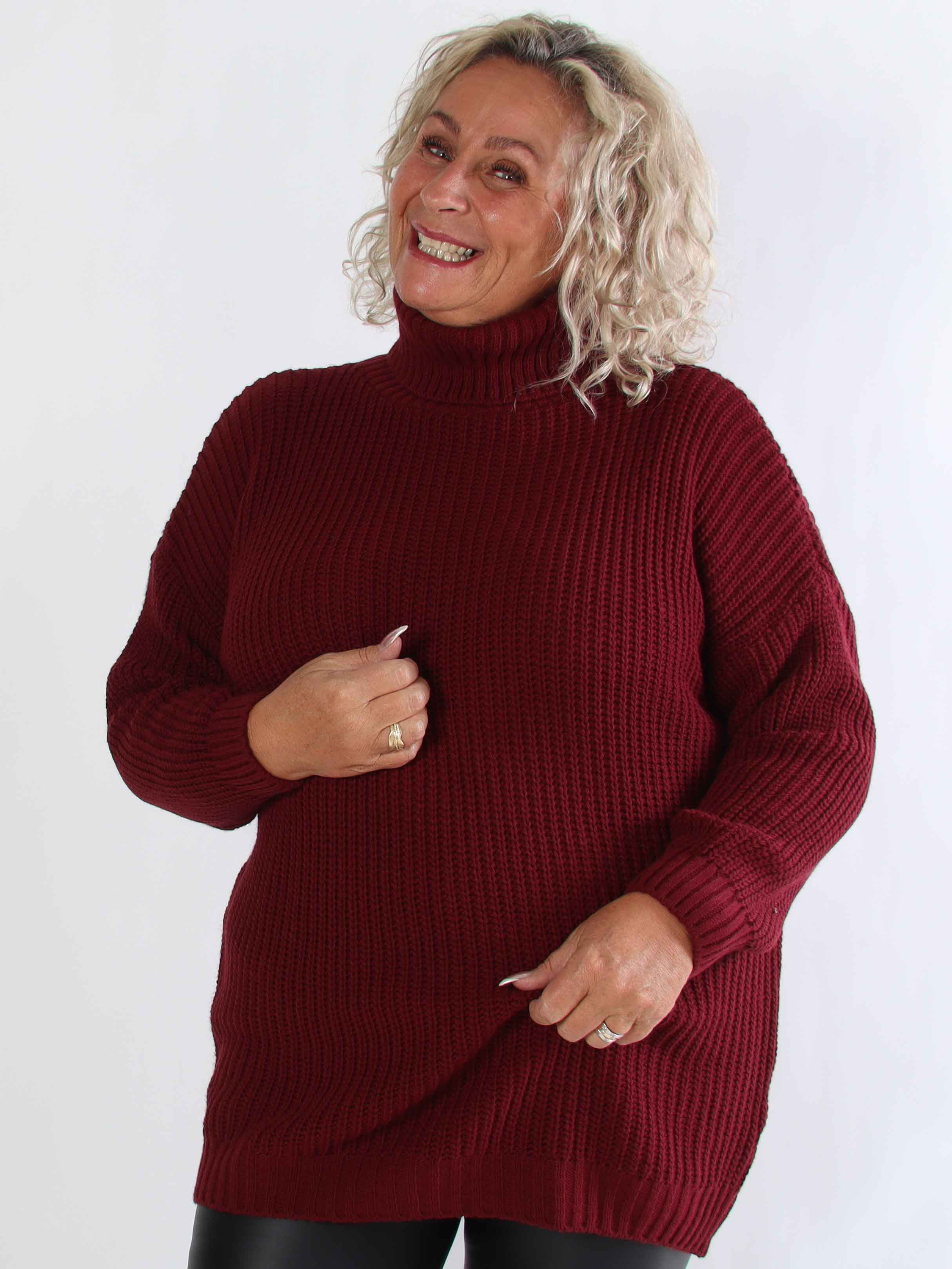 Cindy - Ensfarvet hyggelig plus size striktrøje med rullekrave