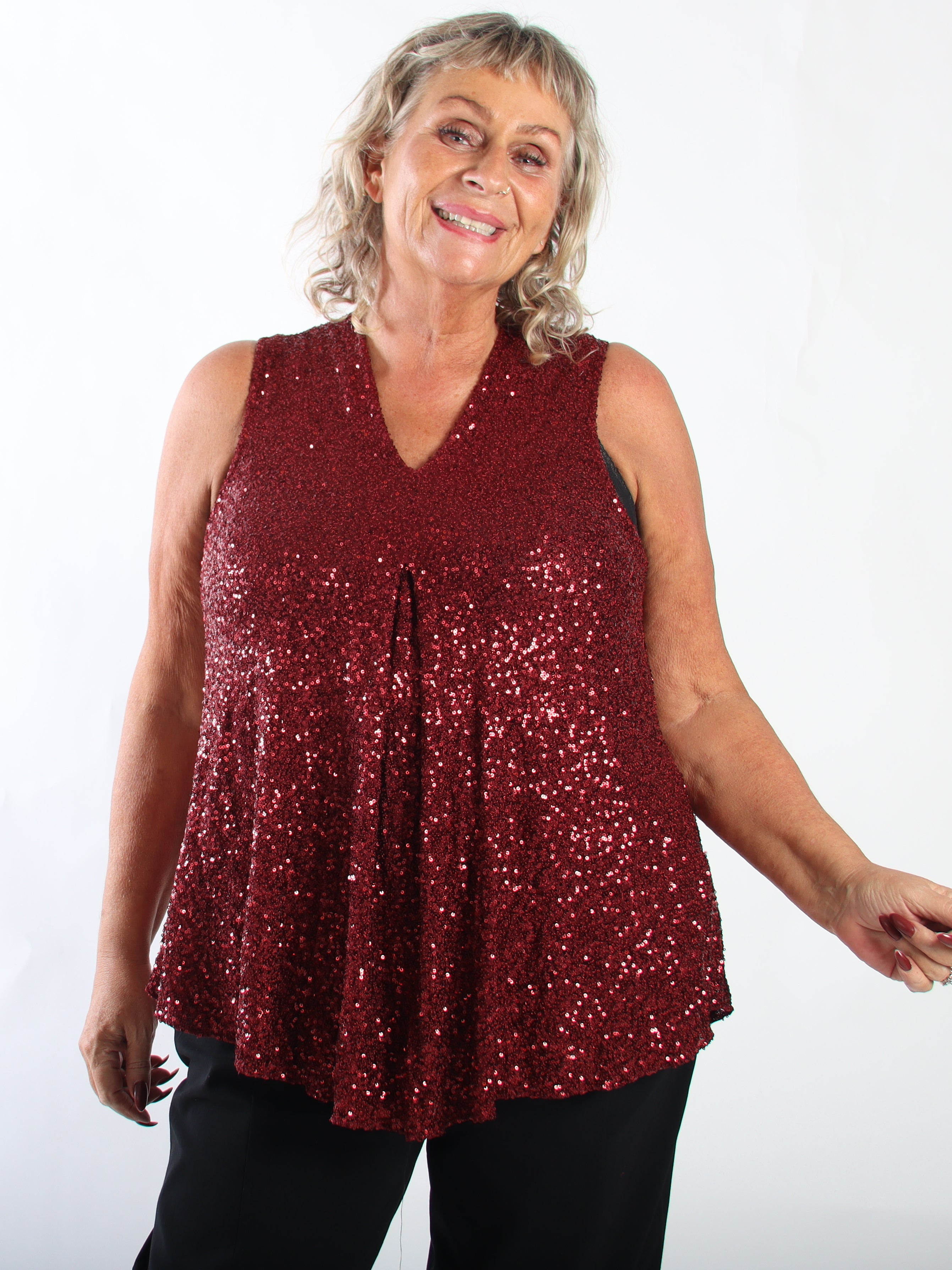 Natalie - Stretchy plus size top med fine pailletter, der giver et festligt og glamourøst look