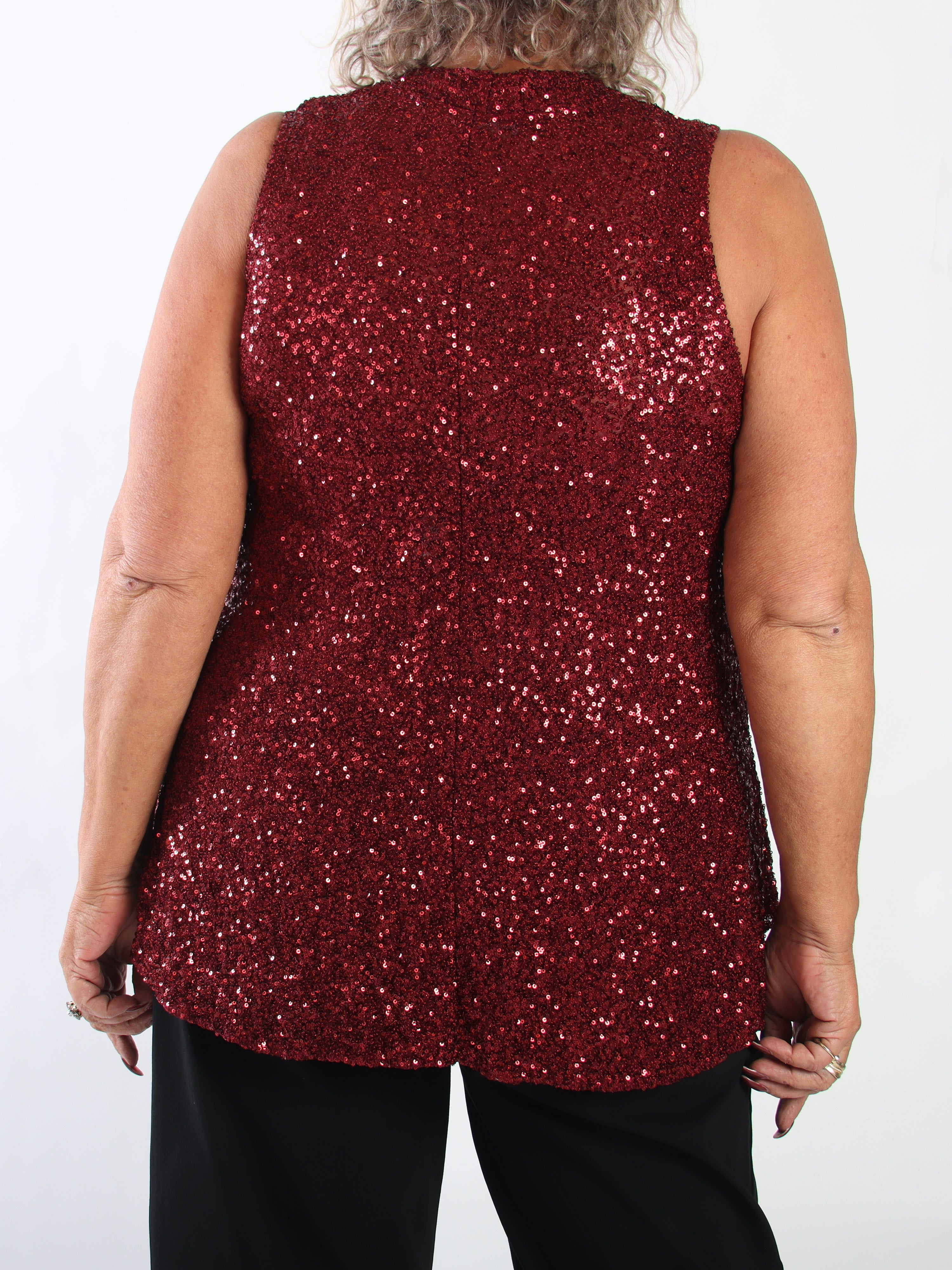 Natalie - Stretchy plus size top med fine pailletter, der giver et festligt og glamourøst look