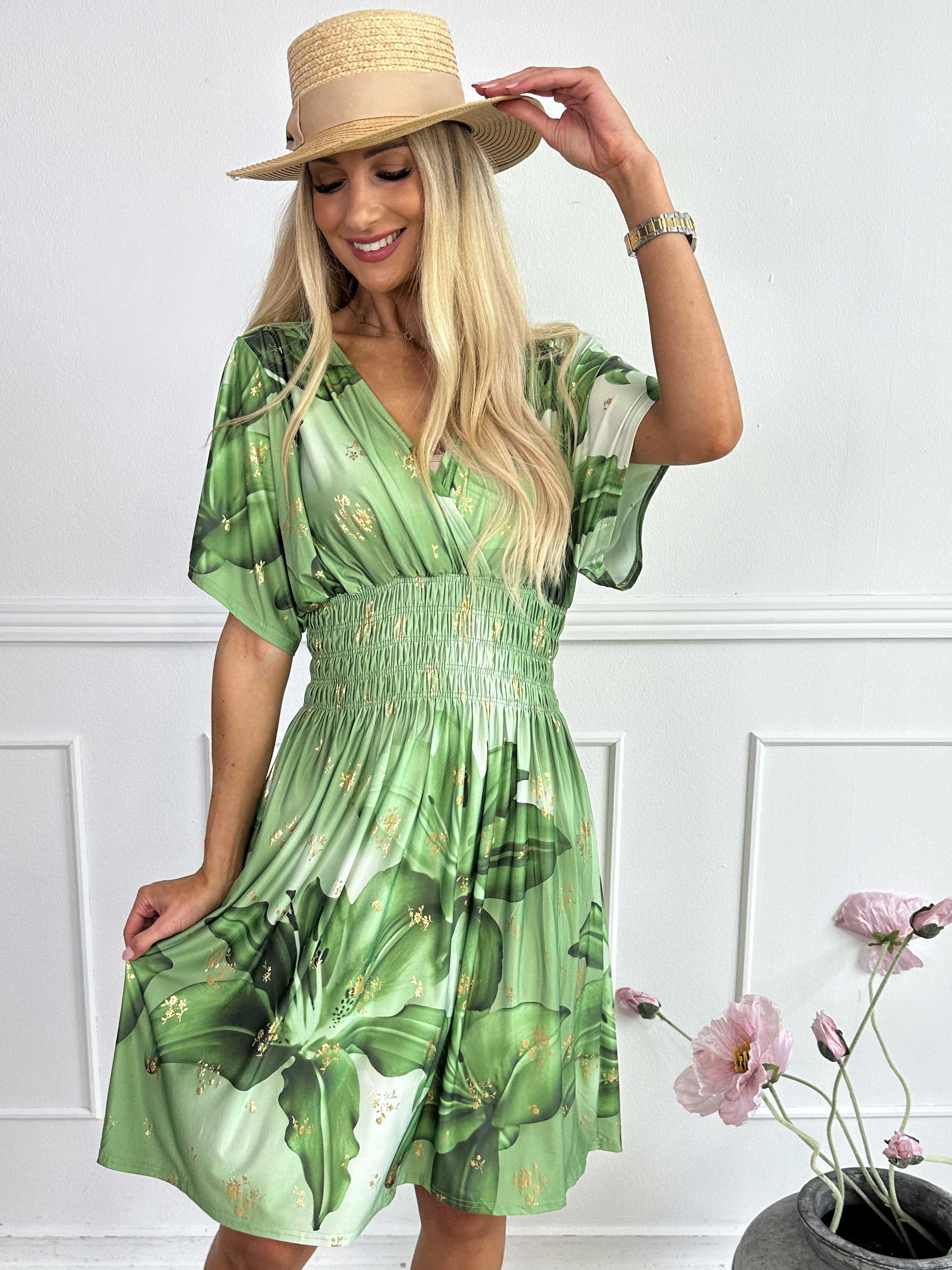 Pams Big Lily Short - Kort elastisk kjole med store liljer og guld detaljer