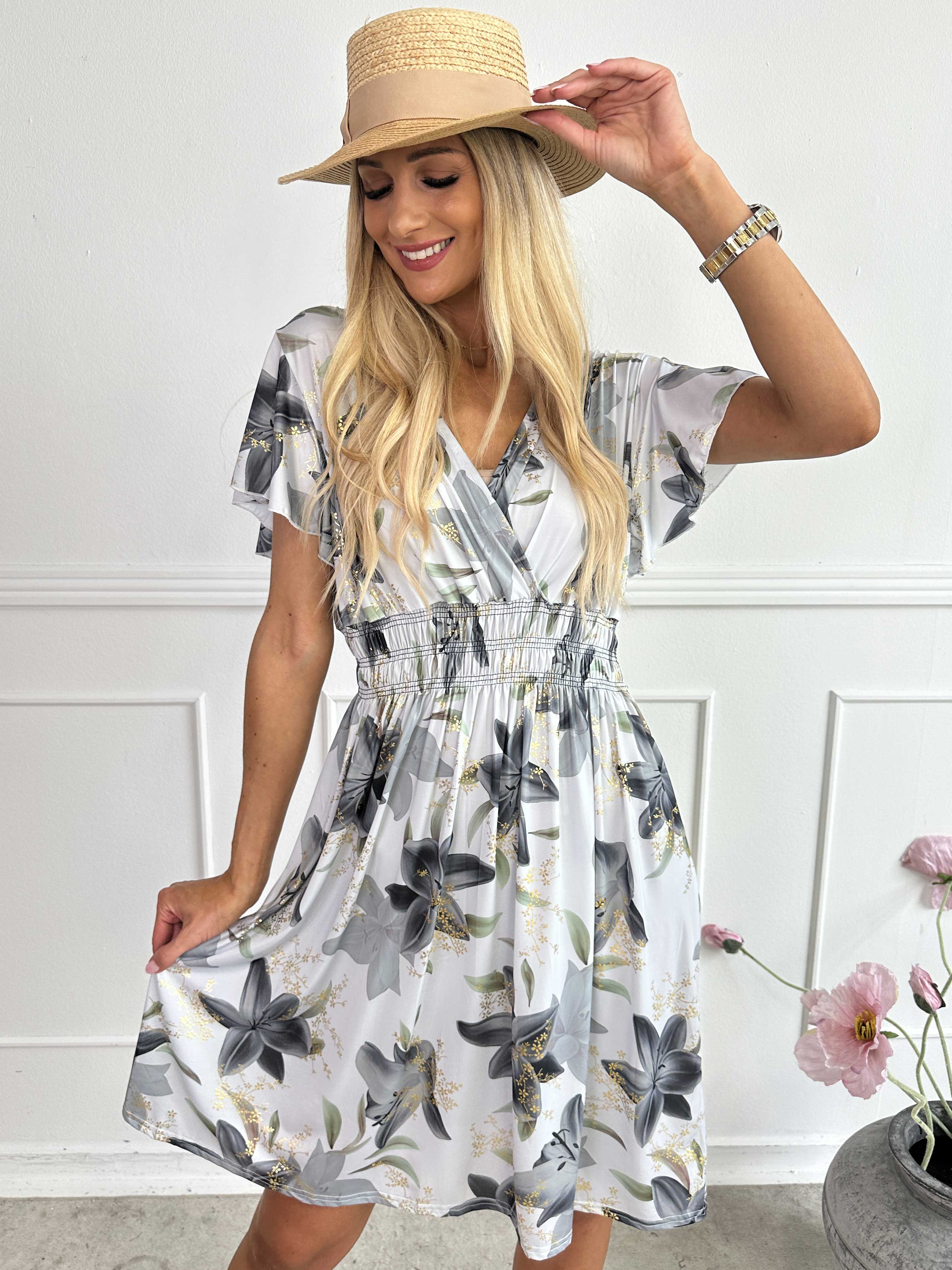 Pams Lilies Short - Kort elastisk kjole med lilje motiver og guld detaljer