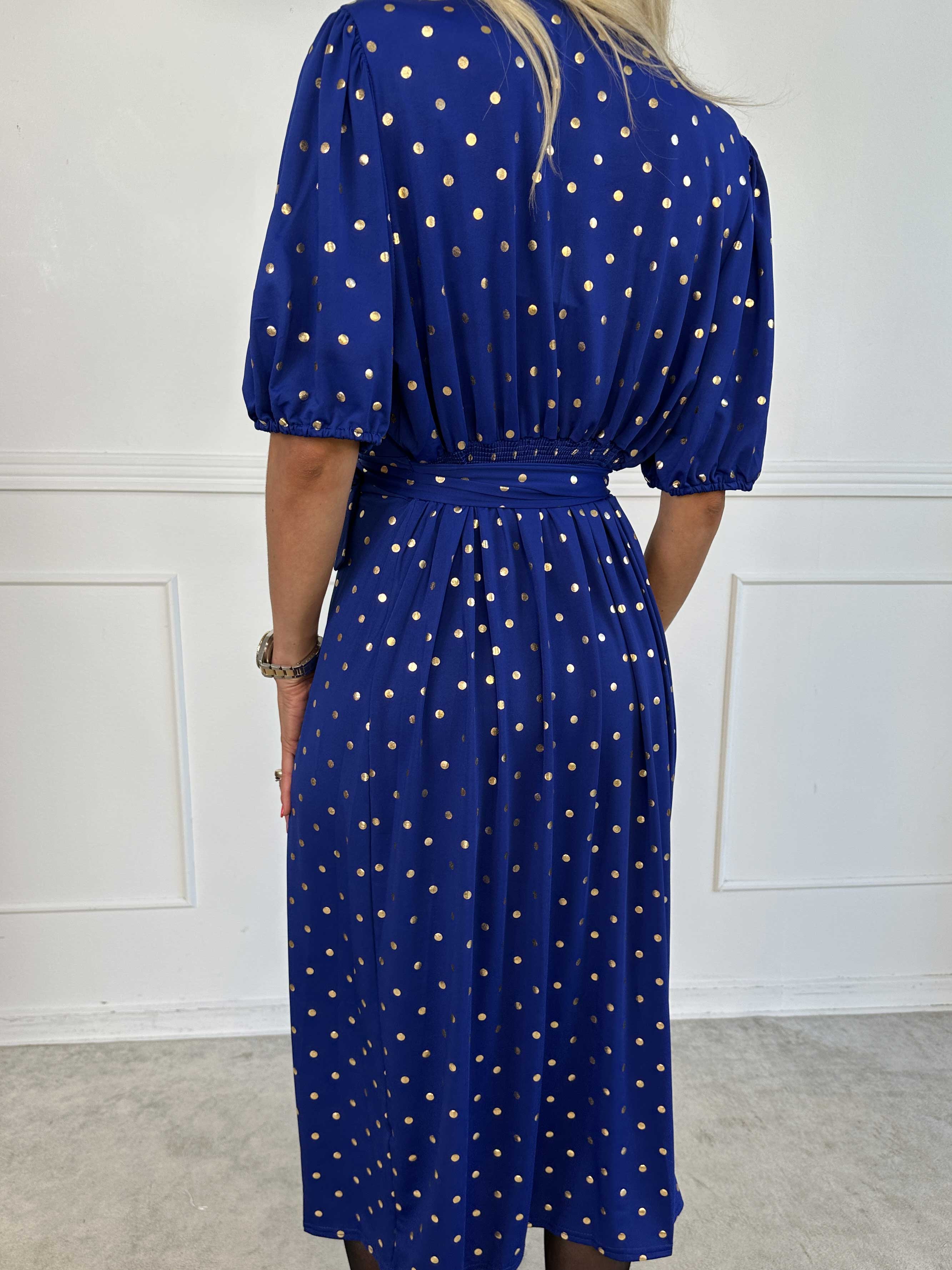 Primula Dust Gold - Kjole i slå-om look med guld prikker