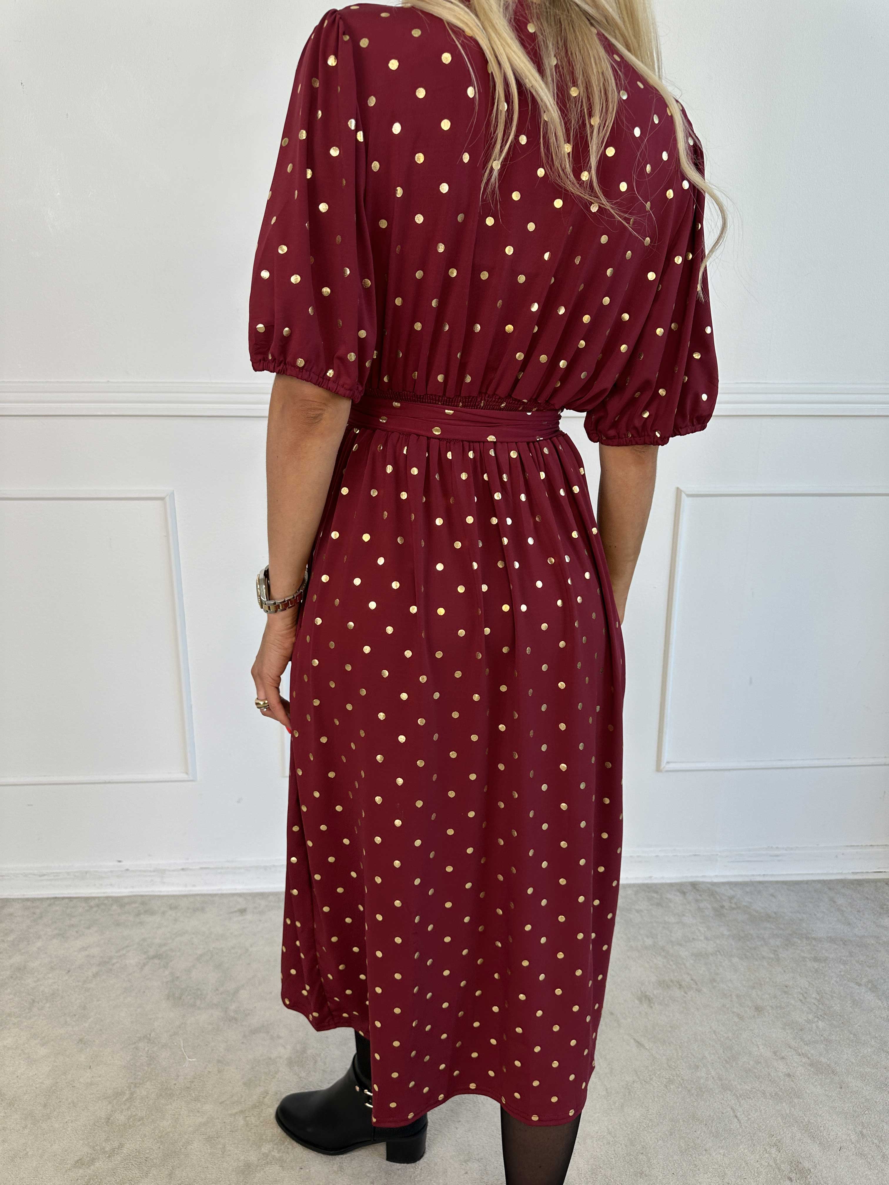 Primula Dust Gold - Kjole i slå-om look med guld prikker