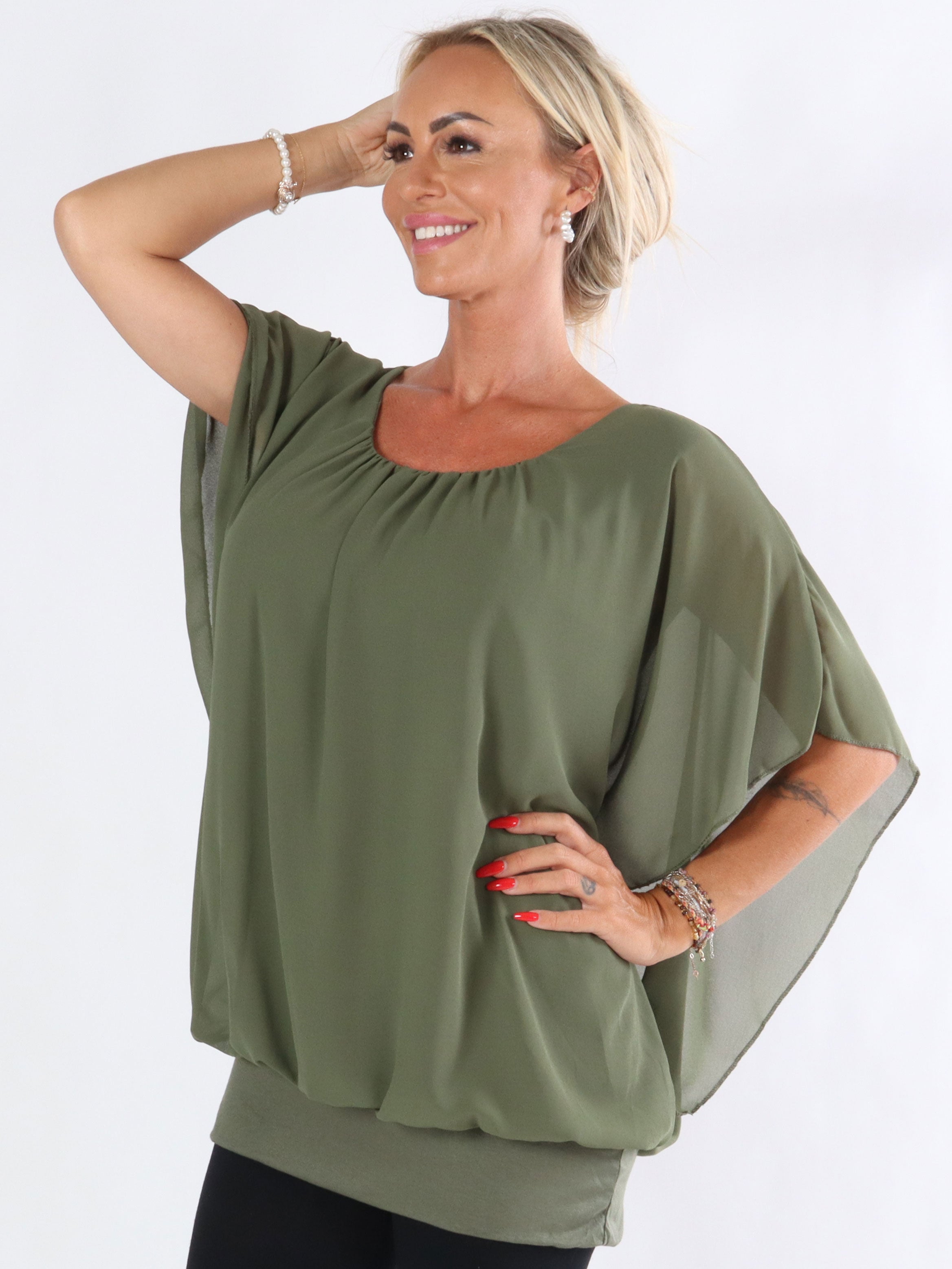 Cala - Elastisk top med løst chiffonstof udover