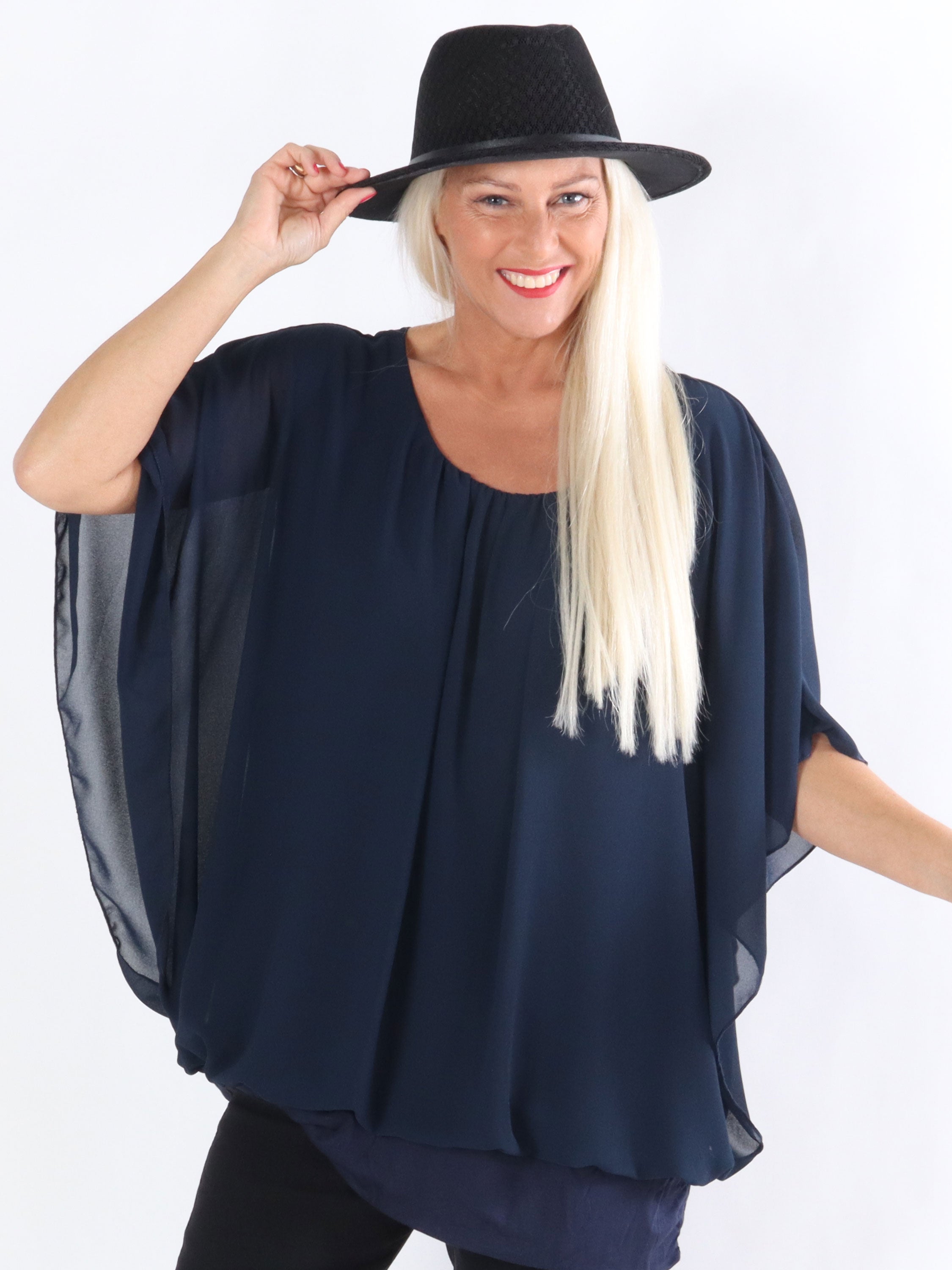 Cala - Elastisk top med løst chiffonstof udover