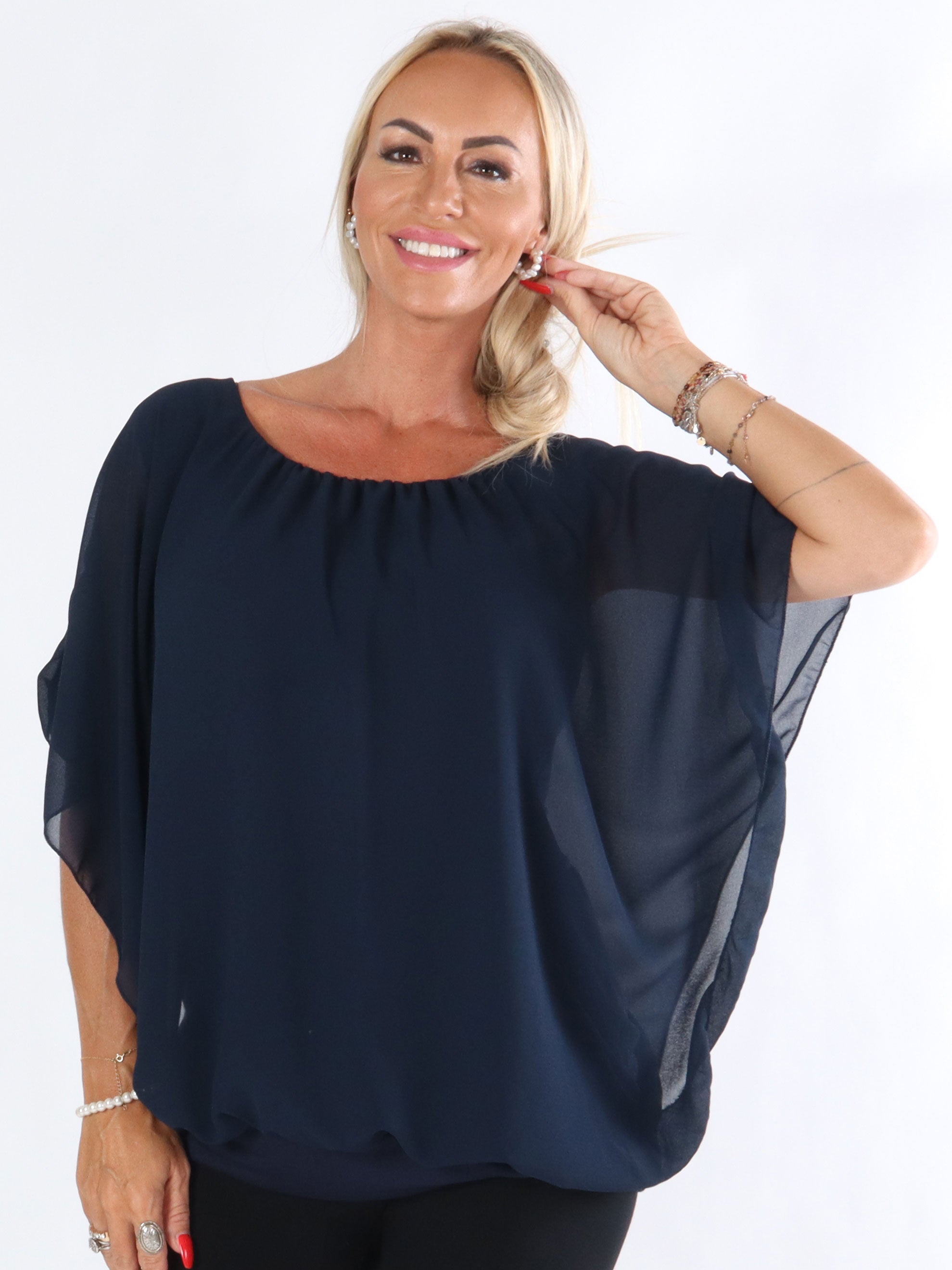 Cala - Elastisk top med løst chiffonstof udover