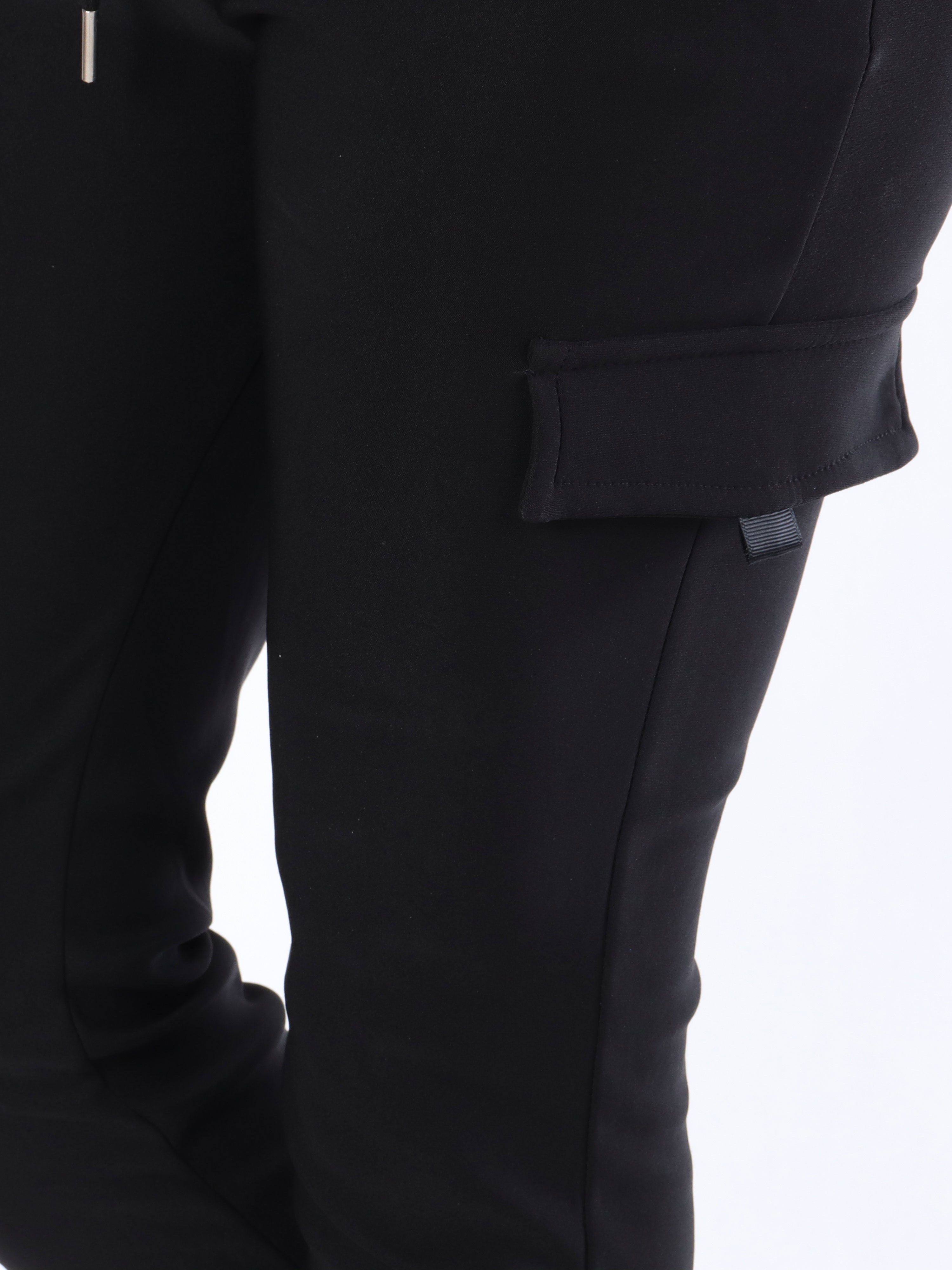 Antonia - Sorte elastiske bukser med lommer på benene