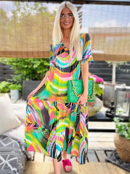 Julita - Kjole med flæsekant i bunden