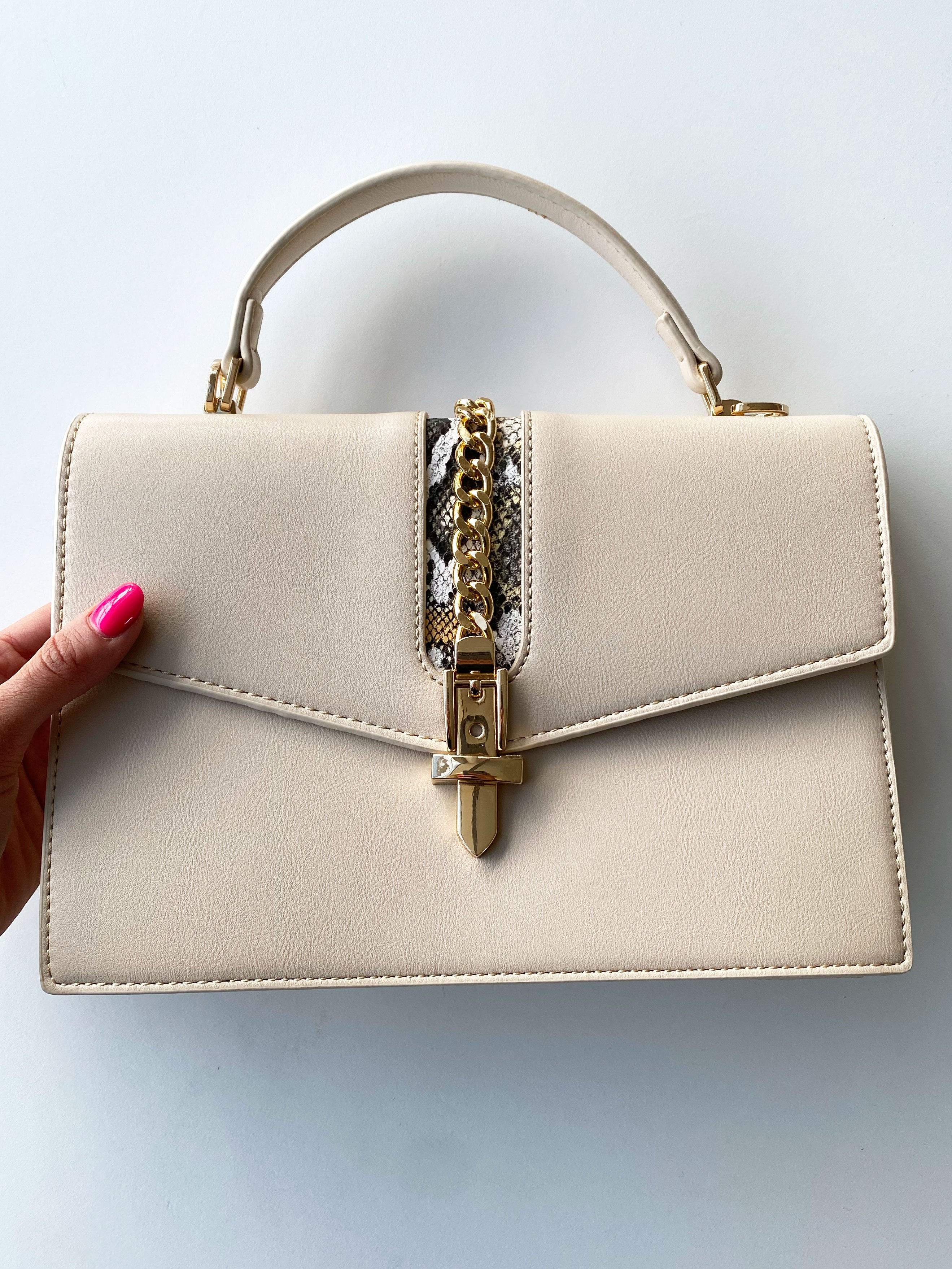 Rio - Håndtaske med gulddetaljer og slangeprint