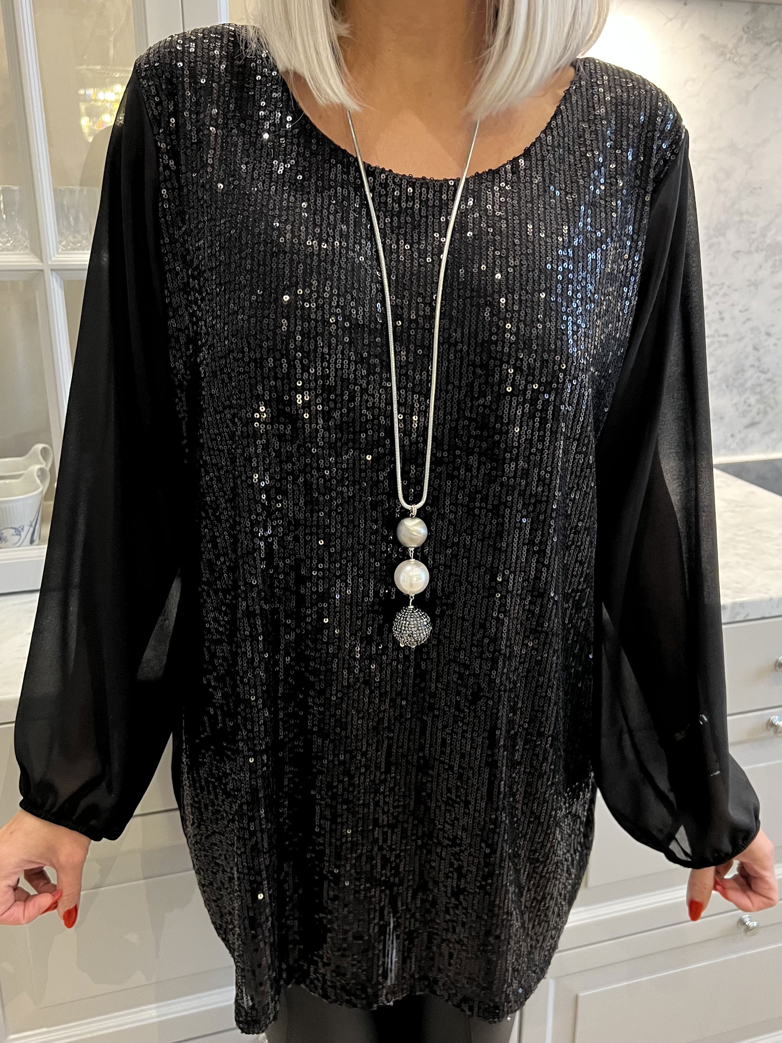 Amani - Fin tunika i chiffon med pailletter