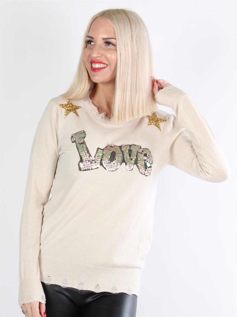 Kelvina - Beigefarvet bluse med tekst og stjerner af pailletter og similisten