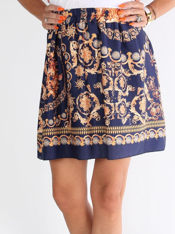 Kesia - Sort nederdel med fine motiver i varme nuancer