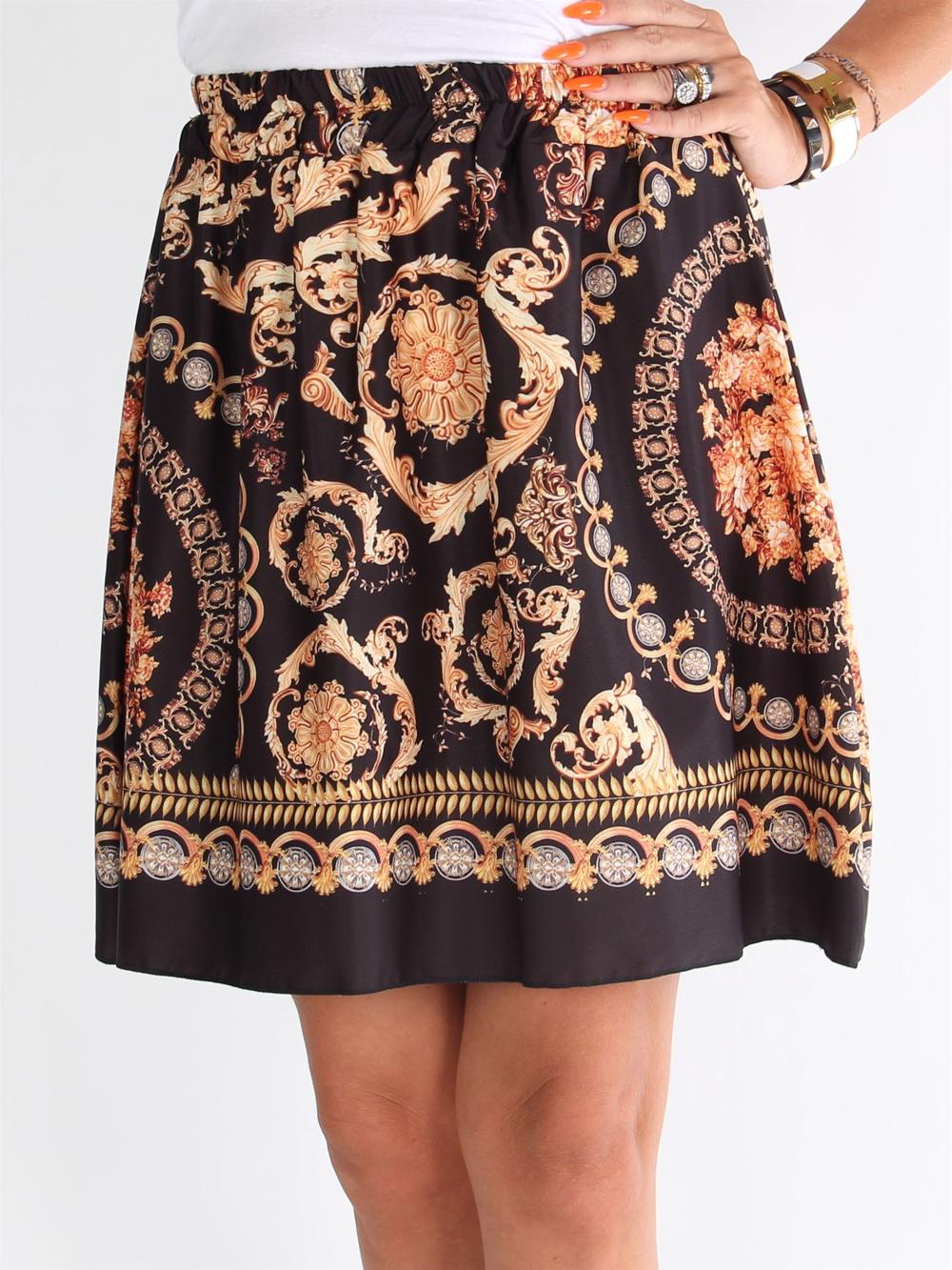 Kesia - Sort nederdel med fine motiver i varme nuancer