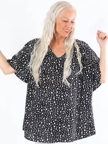 Leslie - Sort bluse med prikker og søde ærmer
