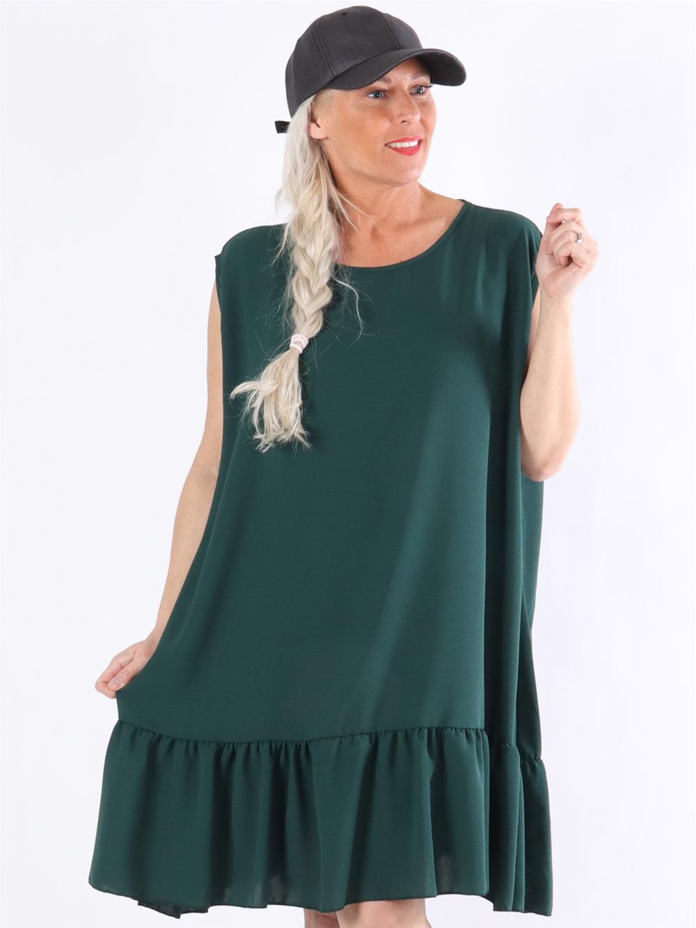 Manola - Kjole i løs pasform med flæsekant forneden