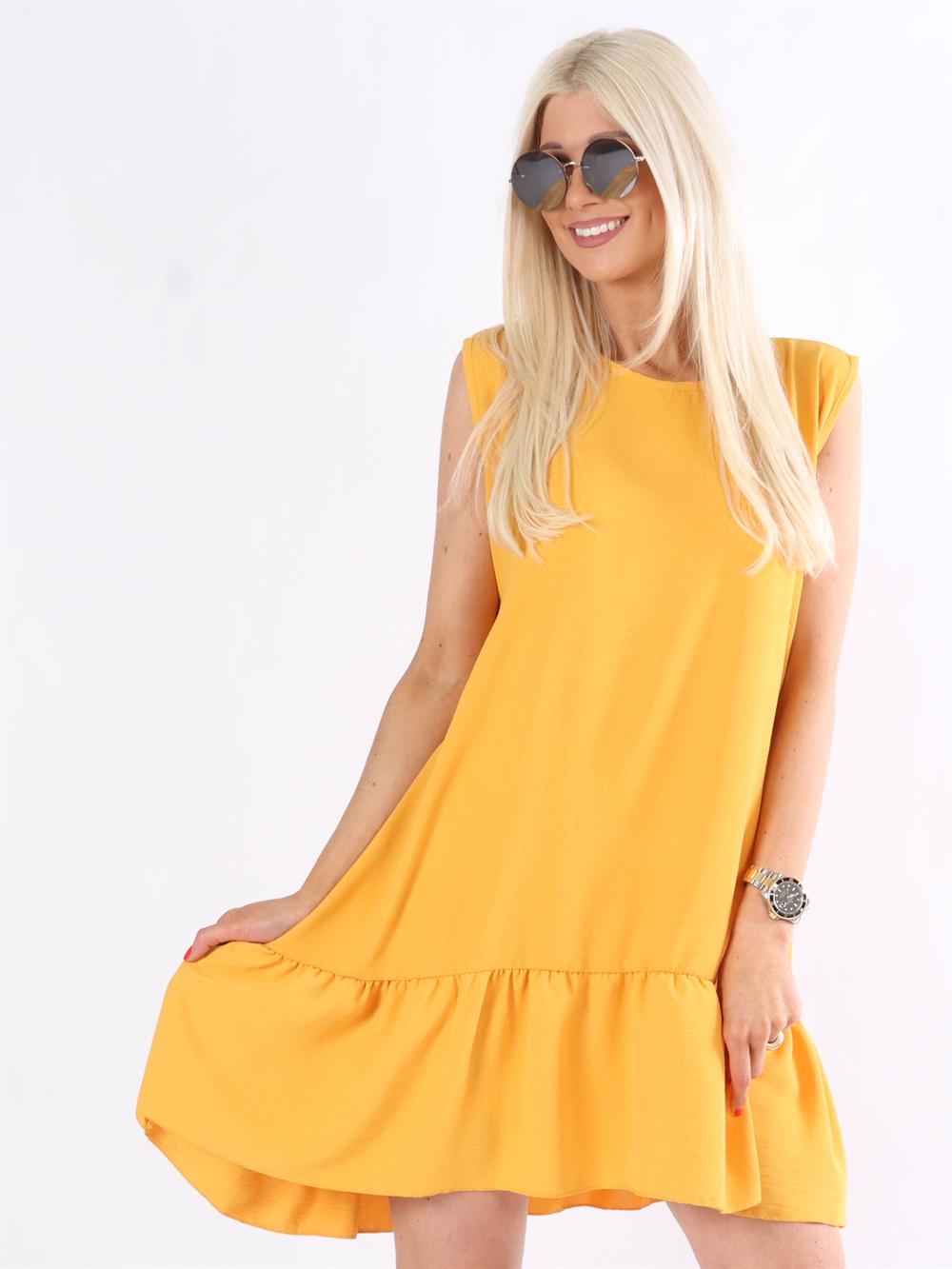 Manola - Kjole i løs pasform med flæsekant forneden